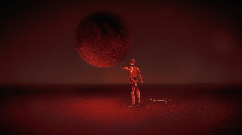 Your player character touching what looks to be a moon, carefully putting his hand on it's surface. A red backdrop lights up the area.