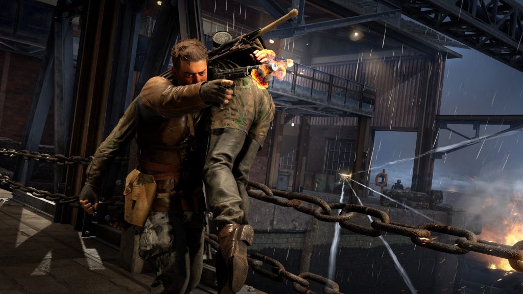 The player character carrying a body while shooting in 'Sniper Elite: Resistance'.
