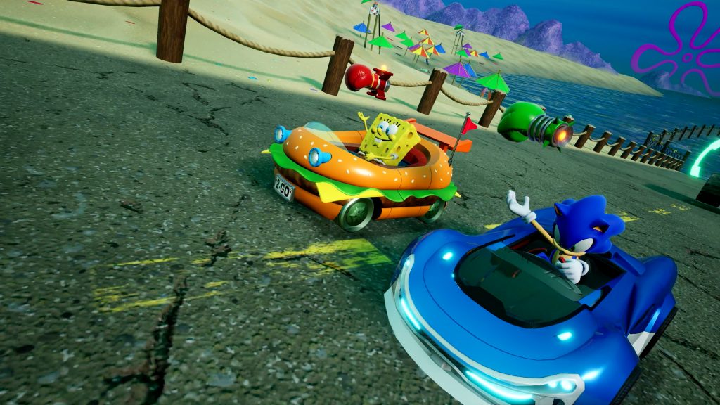 SpongeBob and Sonic driving seemingly right next to Goo Lagoon.