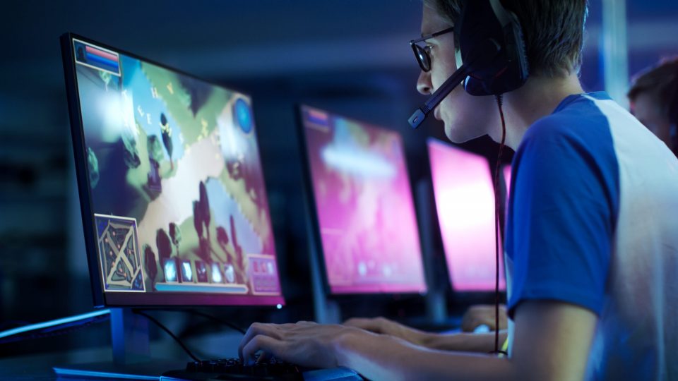 A game developer working on a video game.