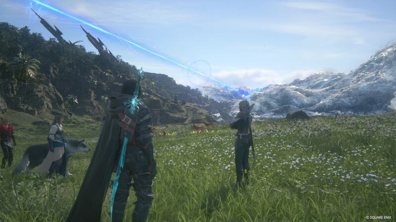 Clive and friends standing in an open field allowing you to view the scenery with mountains off in the distance