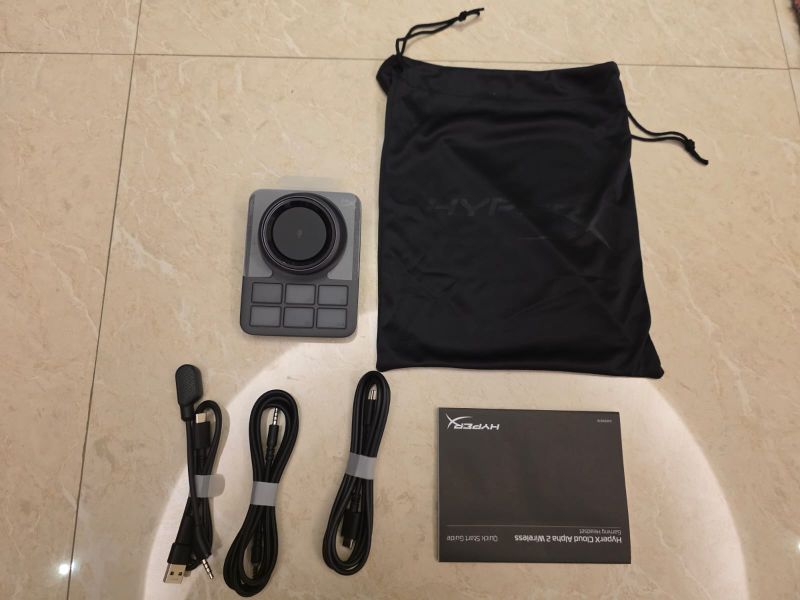 HyperX Cloud Alpha 2 items from the packaging include base station, cables, adapter, and soft puch