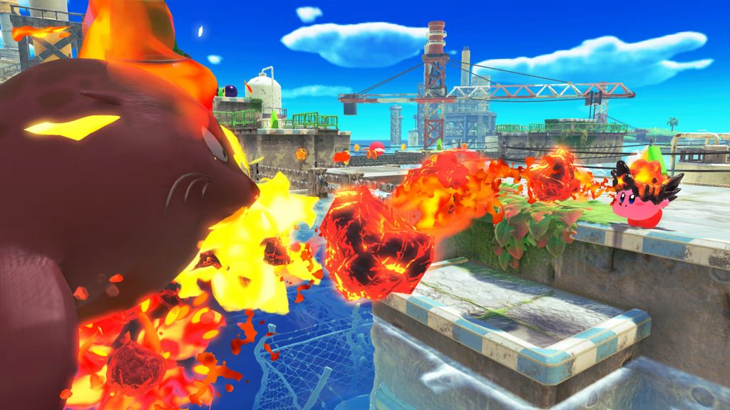 Kirby using an upgraded Flame ability to attack.