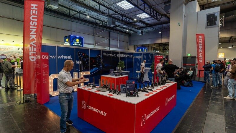 A guy setting up a booth at an event