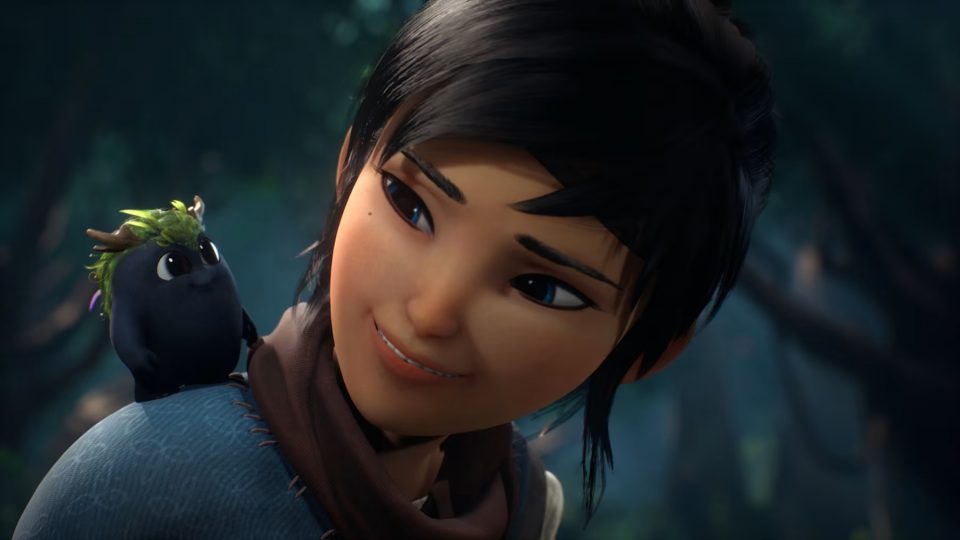 Kena looking over at her adorable Rot companion in 'Kena: Bridge of Spirits'.