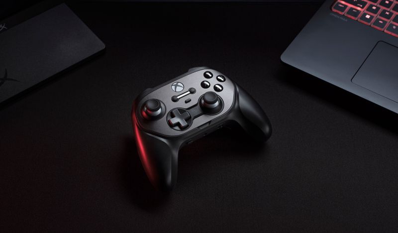 HyperX Clutch Talon Controller next to Omen Laptop