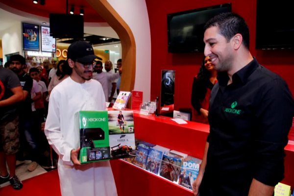 Man in UAE buying an Xbox One During a Launch Event