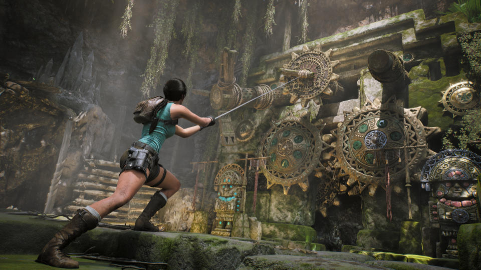 Lara using a grappling hook to solve puzzles in 'Legacy of Atlantis'.