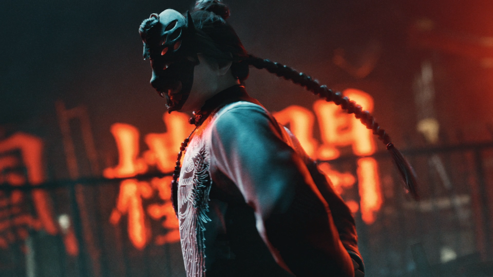 In-game screenshot of the Bakunawa Killer in action, looking imposing with a mask concealing his true identity.