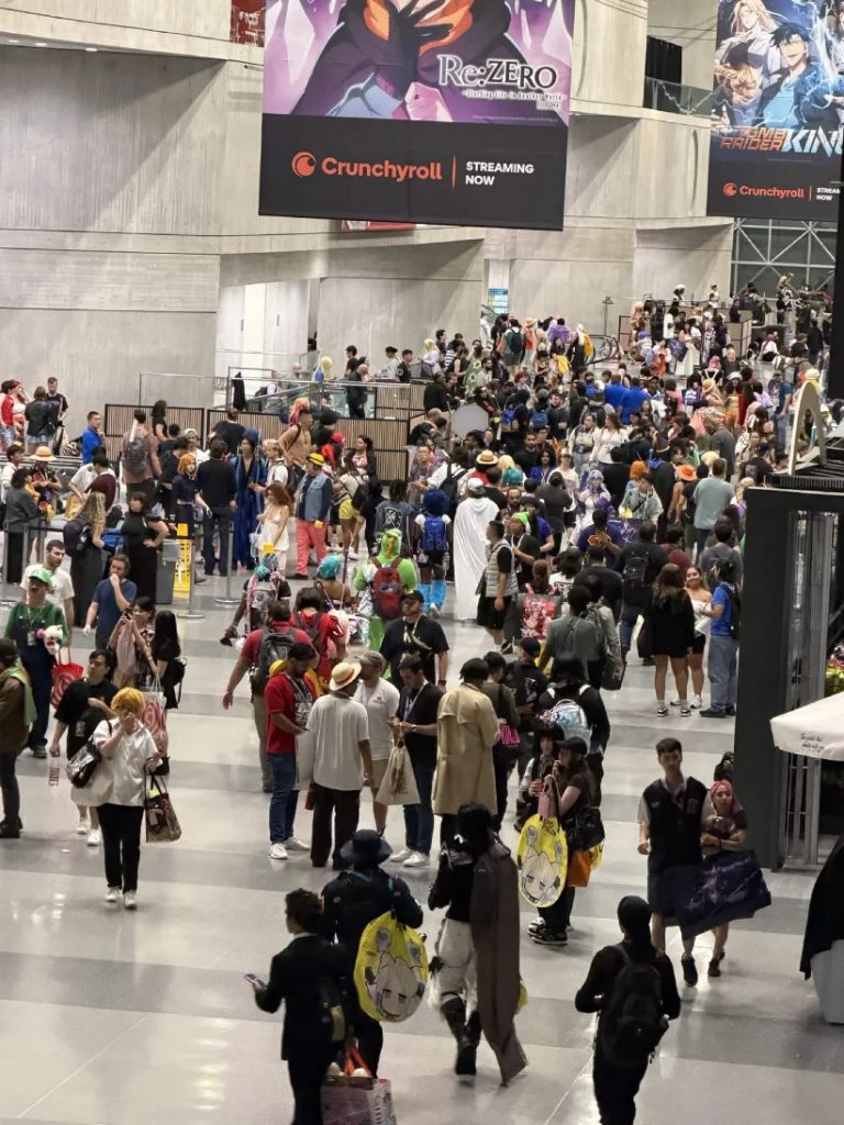An overview shot of various people exploring the Expo.