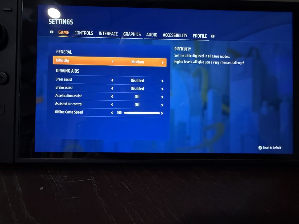 Some of the various difficulty options and driving assist features of 'Hot Wheels Infinite Rush'