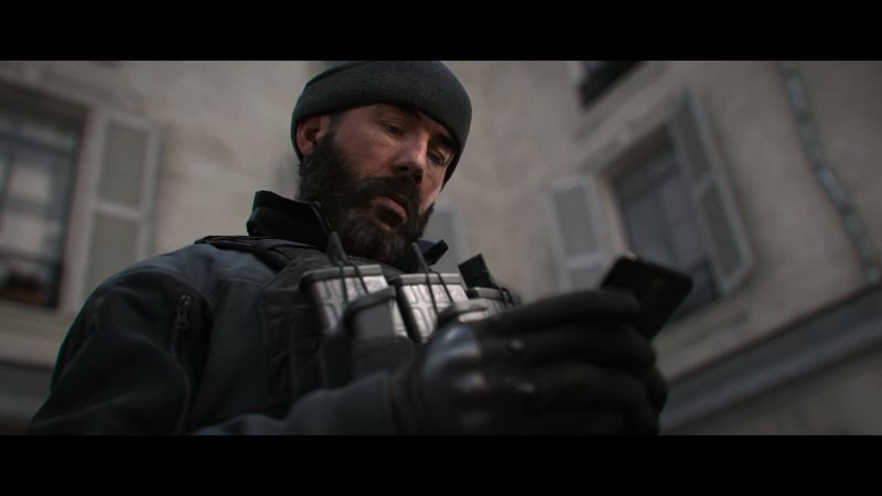 Modern Warfare 4 Price Looking down at his Phone